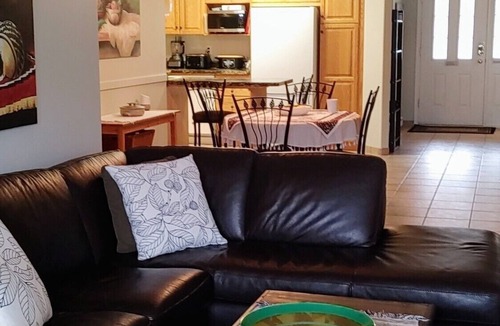 Okanagan-Similkameen Condo | Executive Lakeshore Condo bordering the lake, the KVR trail and Lions Gardens.
