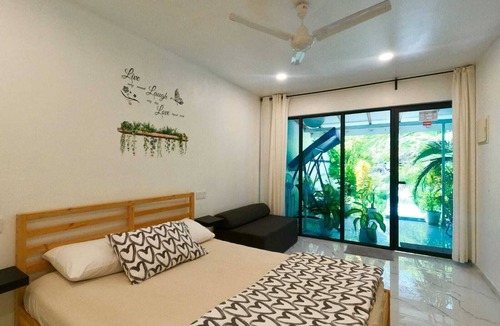Kudahuvadhoo Hotel | Wake Up to Garden Views and Crisp Island Air"