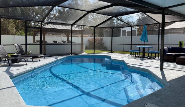 Cozy, Pet-Friendly Tampa Home with Heated & Screened Pool - 4 miles to Adventure Island/Busch Garden in Tampa