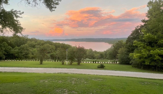 Gated lakefront Acreage with Views and Beach Access - 4 BR Table Rock Lake Home in Lampe