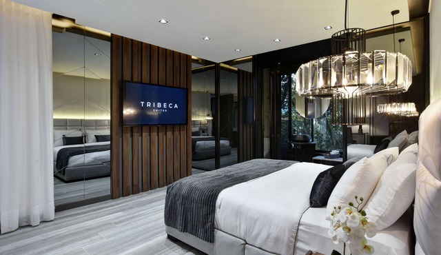 Luxury 4BR Villa with Rooftop and Jacuzzis on Lleras Park in Medellín
