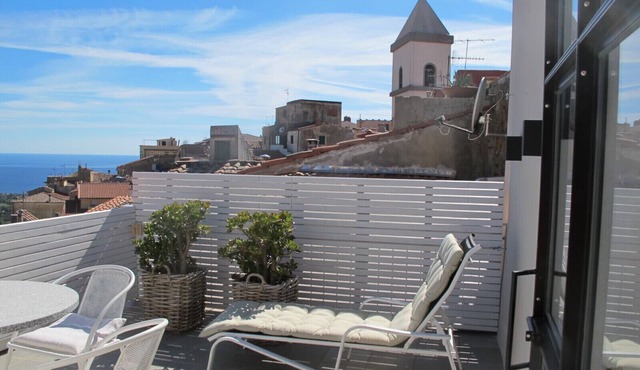 Old town house with roof terrace and magnificent view in Capoliveri