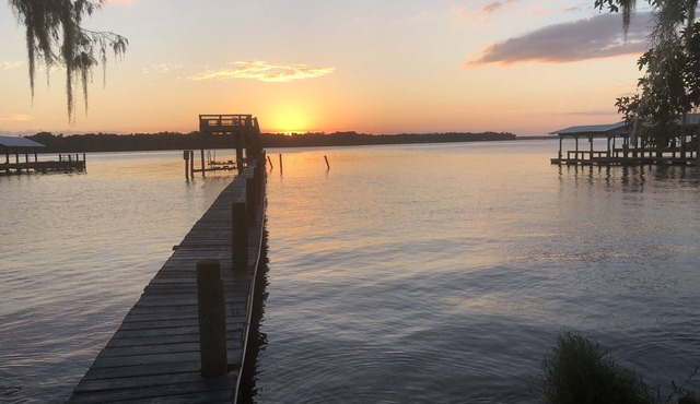 Peaceful Waterfront Home on St. Johns with large porch and dock. in Georgetown