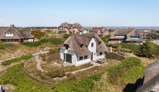 Stilvoll. Reet. Kamin. Ferienhaus Dünemwai "miarwüfki" Objekt-id: Mwr/03 in Rantum