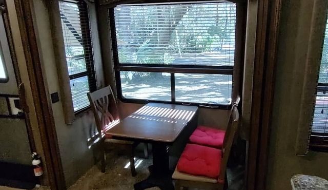 Cozy RV in Enchanting Silver Springs with WiFi, AC, TV, fire pit & horse stable in Silver Springs